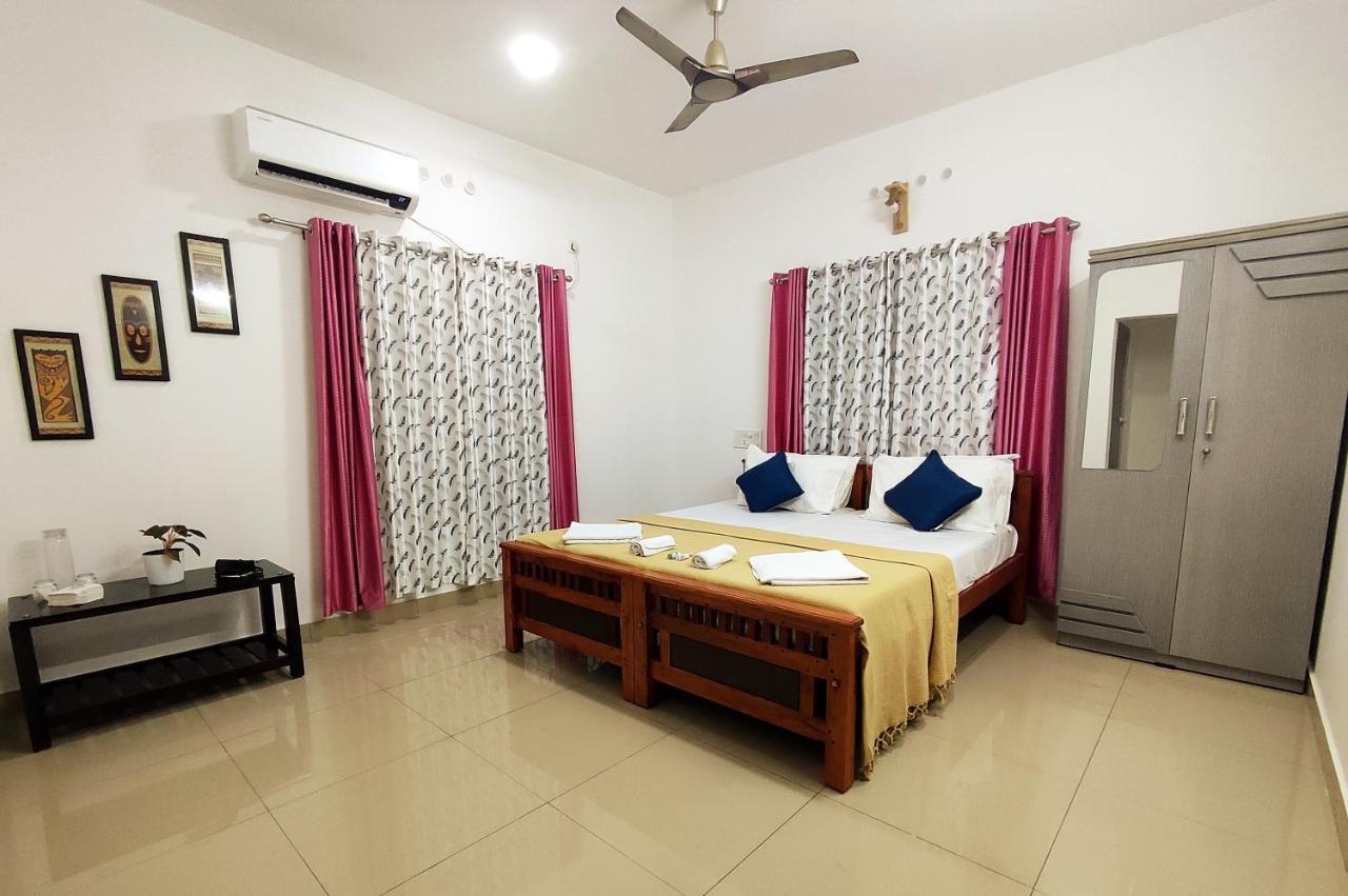 Happy Buddha S4 Aparthotel Varkala Buitenkant foto
