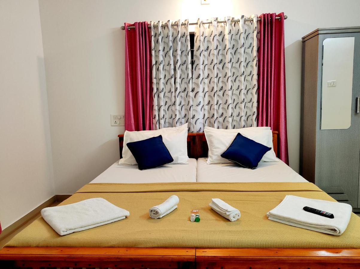 Happy Buddha S4 Aparthotel Varkala Buitenkant foto