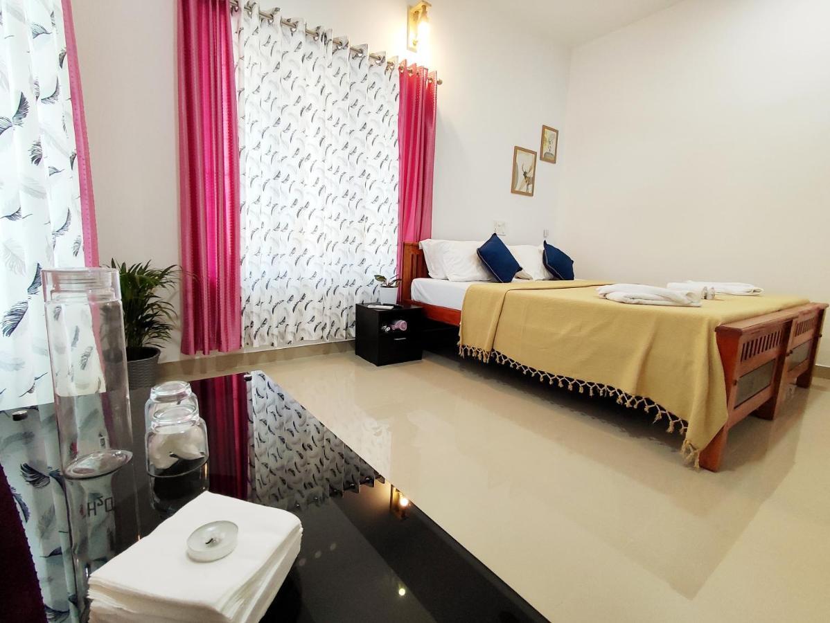 Happy Buddha S4 Aparthotel Varkala Buitenkant foto